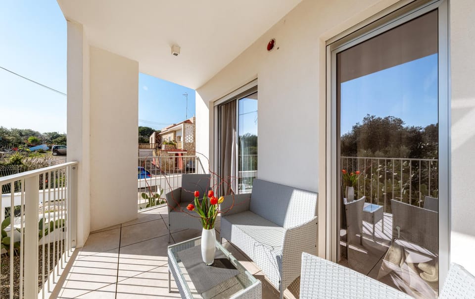 Property building, View (from property/room), Balcony/Terrace, Living room, Seating area