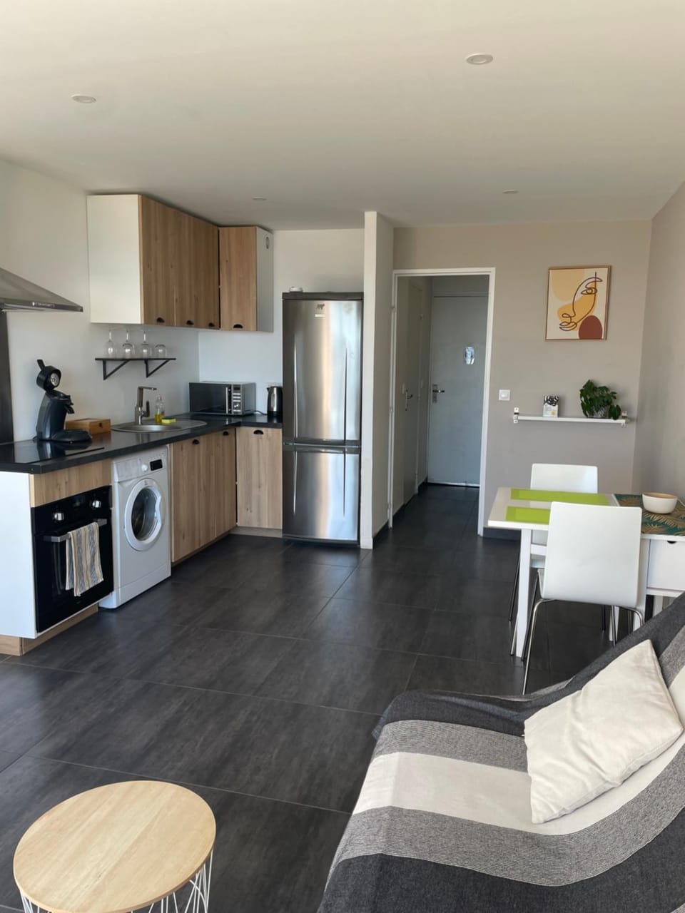 Kitchen or kitchenette, Living room, Dining area, oven, stove, toaster, washing machine