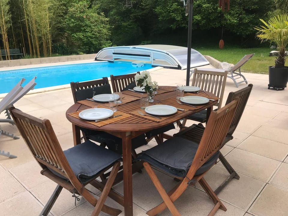Patio, Dining area, Pool view
