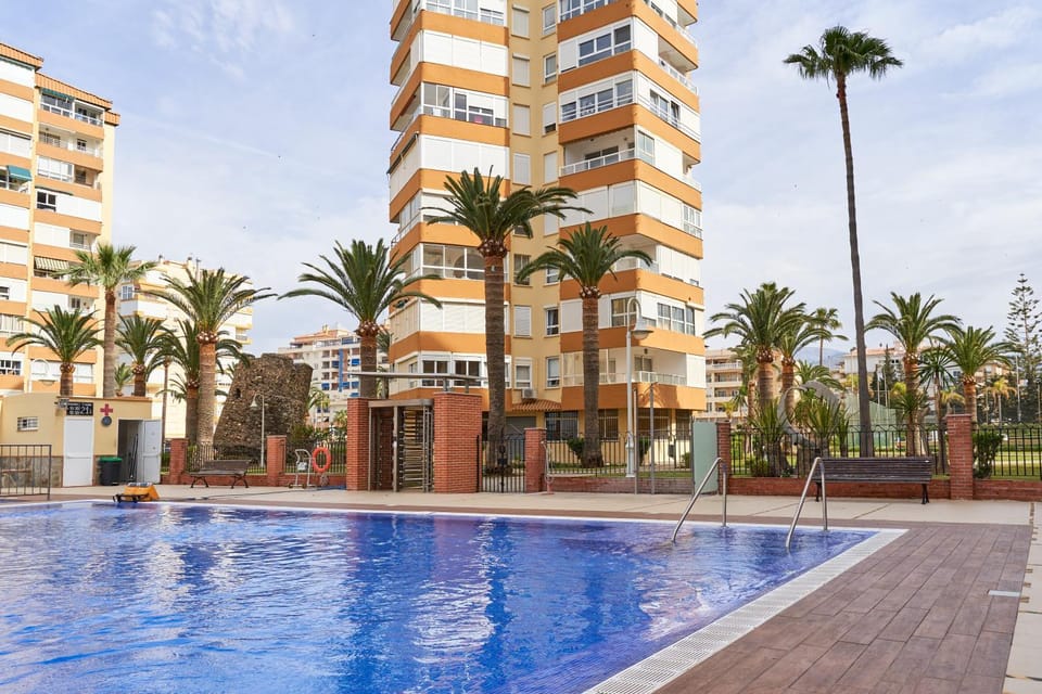 Property building, Living room, Swimming pool