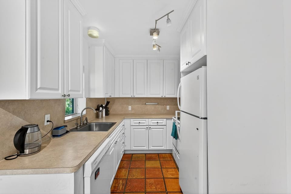 Kitchen or kitchenette, microwave, oven, stove, kitchen