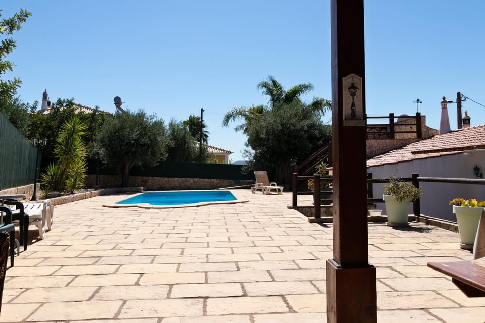 Property building, Patio, Day, Pool view, Swimming pool, sunbed