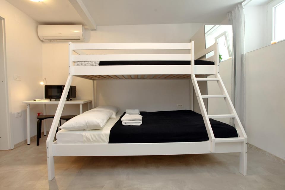 bunk bed, minibar, air conditioner
