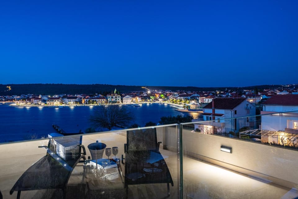 Night, Balcony/Terrace, Decorative detail, Seating area, City view, Sea view