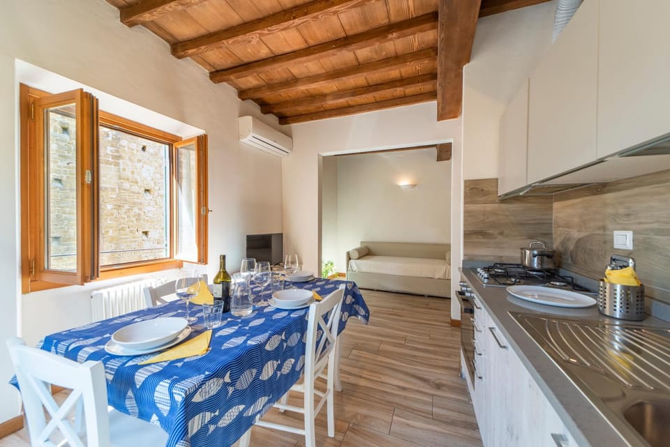 Bed, View (from property/room), Kitchen or kitchenette, Living room, Dining area, City view