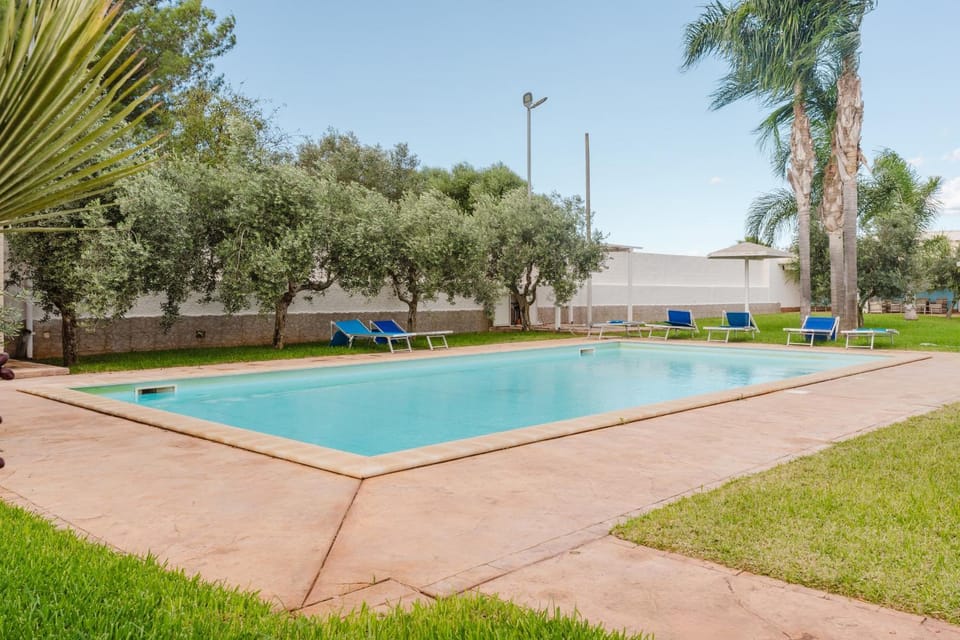 Property building, Living room, Swimming pool
