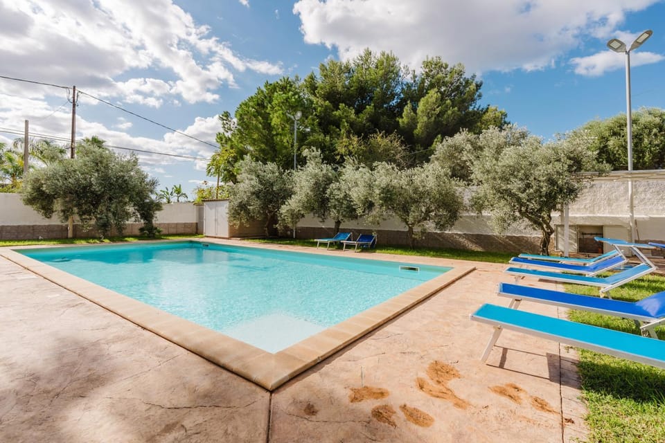 Property building, Living room, Swimming pool