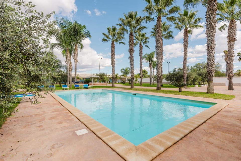 Property building, Living room, Swimming pool