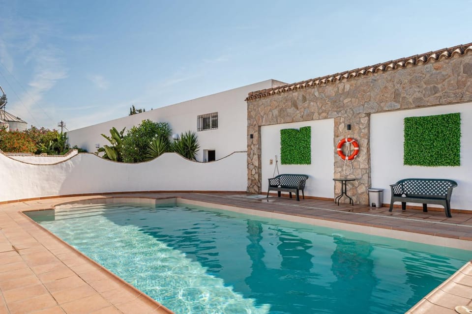 Property building, Living room, Swimming pool