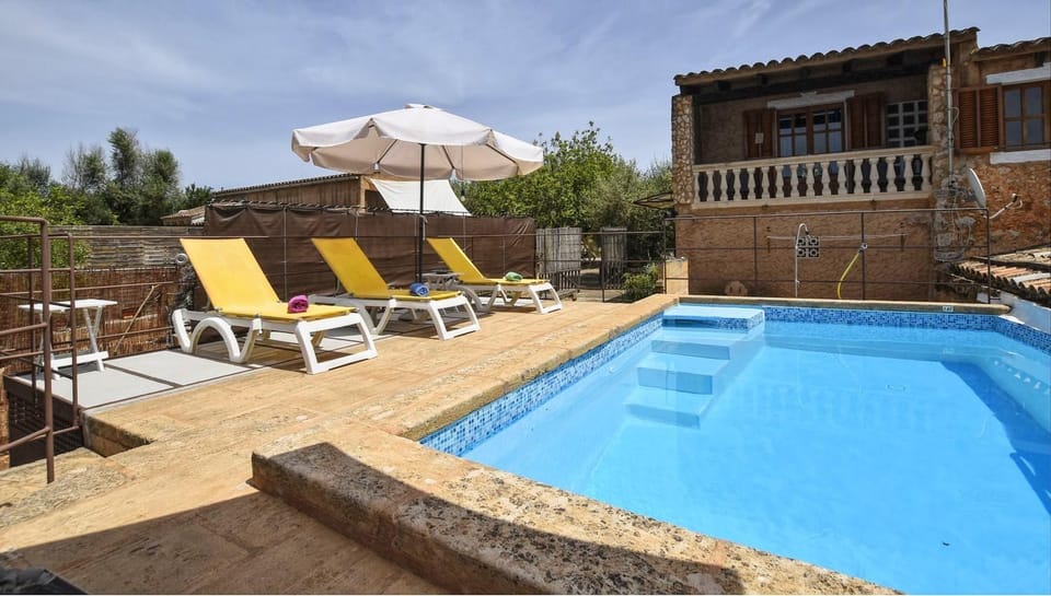 Property building, Living room, Swimming pool