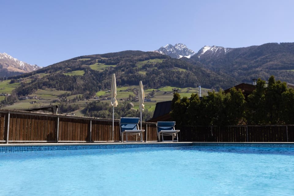 Property building, Living room, Swimming pool