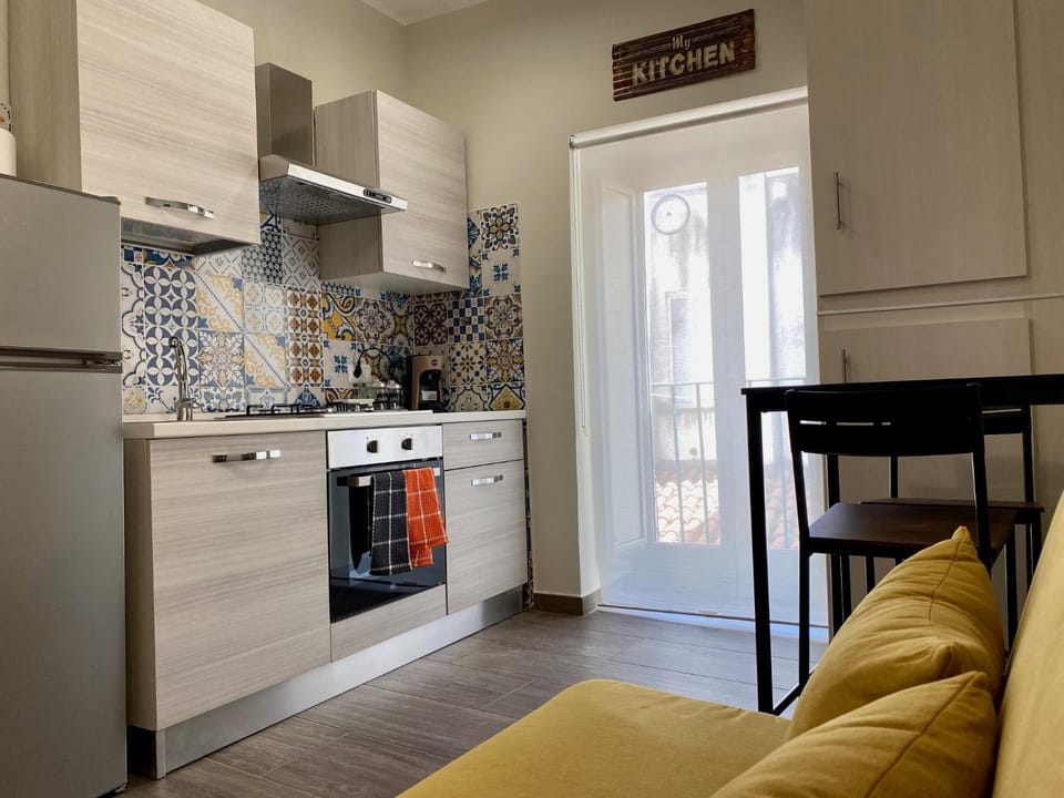 Kitchen or kitchenette, oven, stove