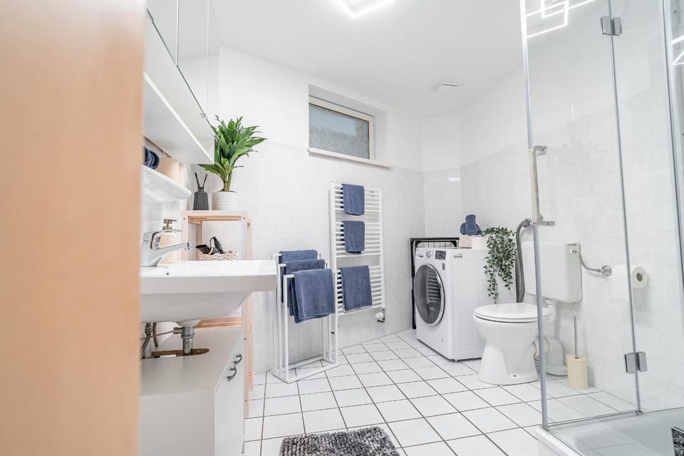 Shower, Bathroom, towels, washing machine, dryer