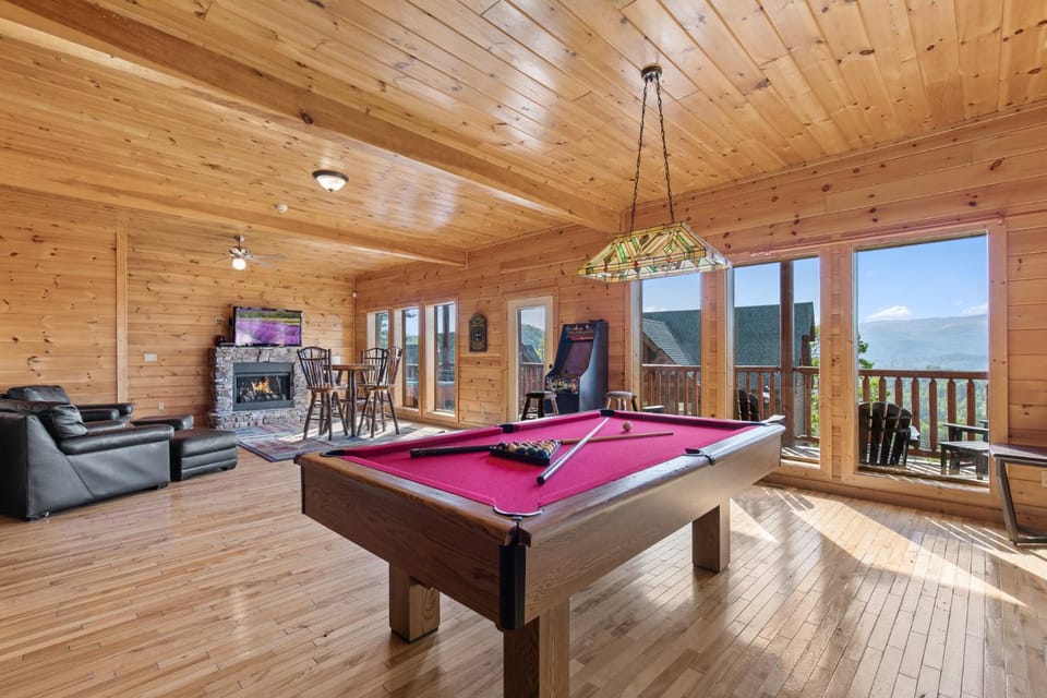 Billiard, Game Room, TV and multimedia, View (from property/room), Living room, Seating area, Mountain view, fireplace, furniture