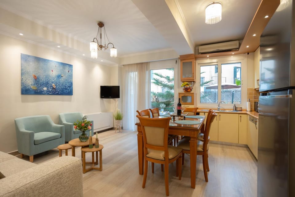 Kitchen or kitchenette, Living room, Seating area, Dining area