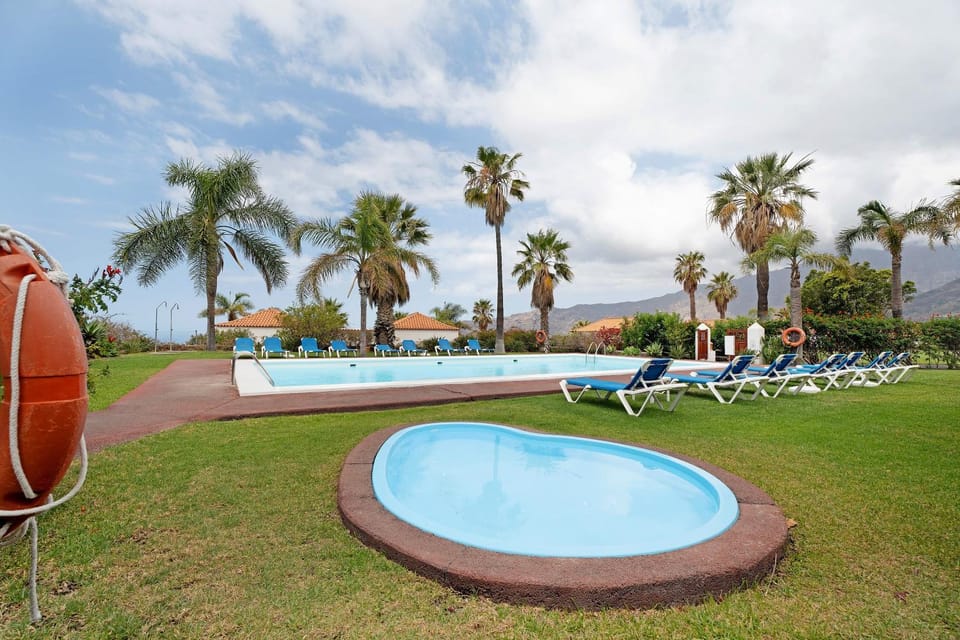 Property building, Living room, Swimming pool