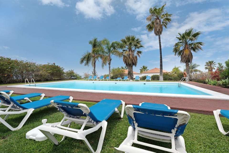 Property building, Living room, Swimming pool