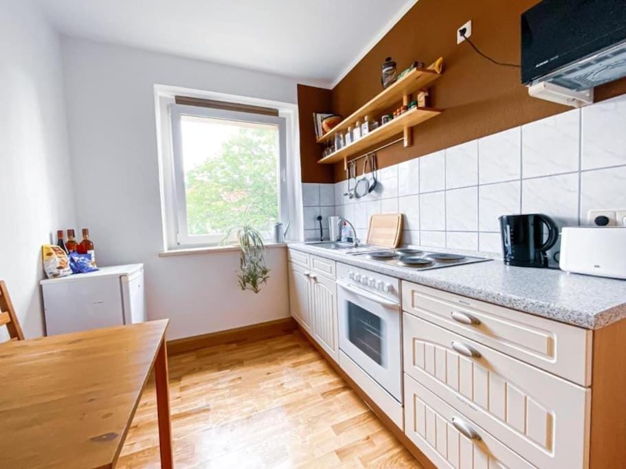Kitchen or kitchenette, Dining area, oven, stove, toaster