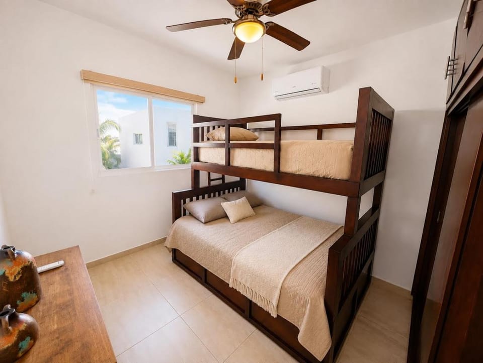 Photo of the whole room, bunk bed, air conditioner