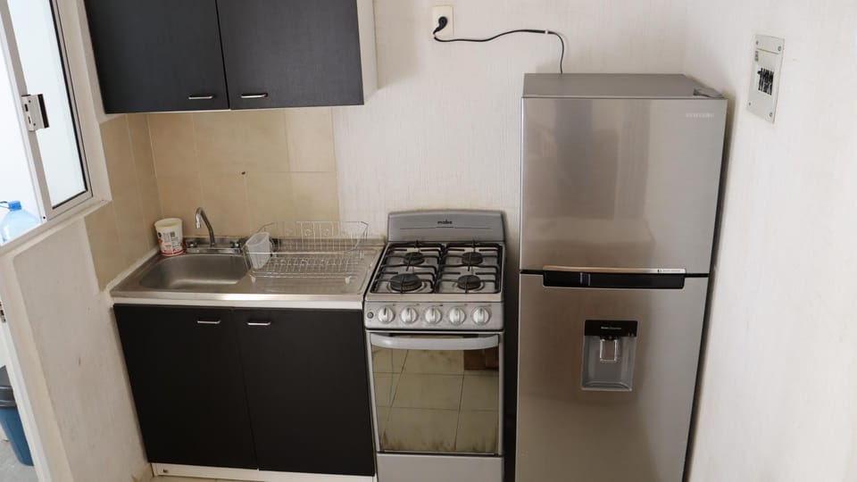 Kitchen or kitchenette, stove, kitchen
