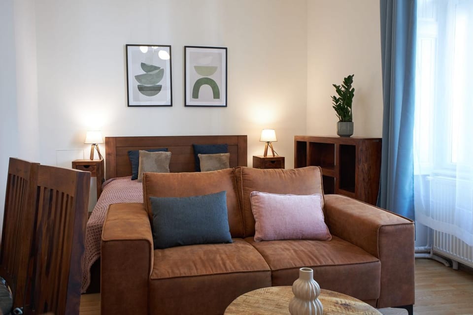 Bed, Living room, Seating area, Bedroom