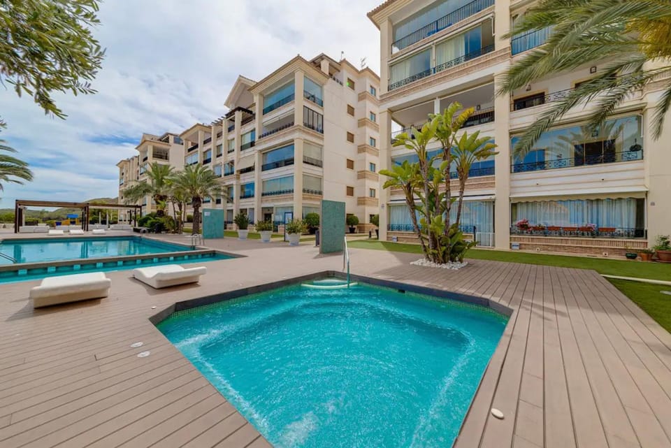Property building, Living room, Swimming pool