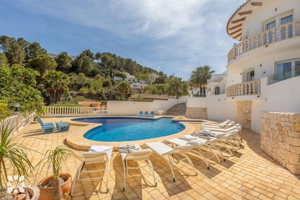 Property building, Patio, Day, Natural landscape, Pool view, Swimming pool, sunbed