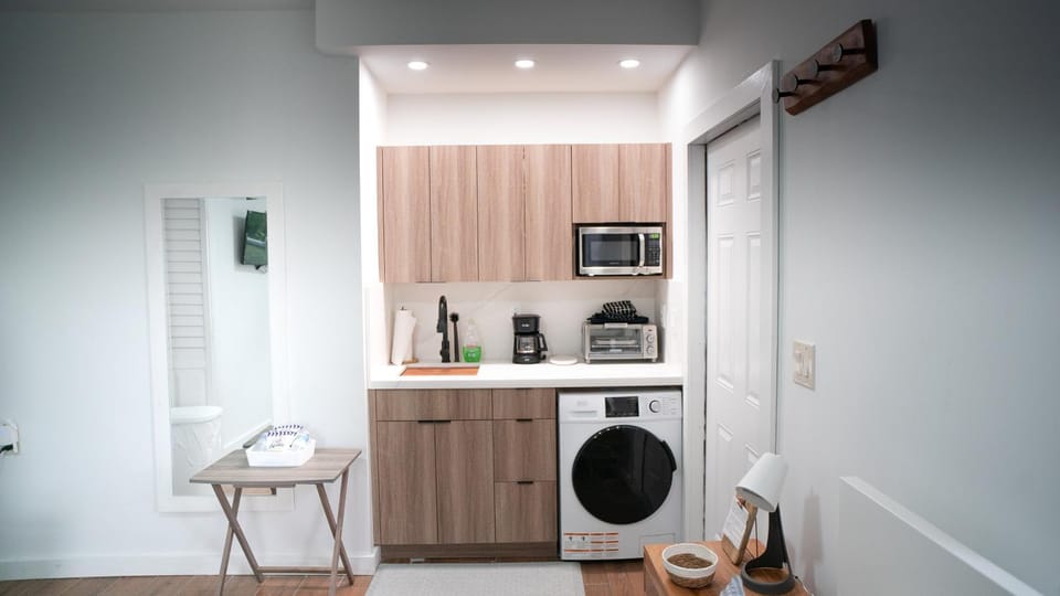 Kitchen or kitchenette, washing machine
