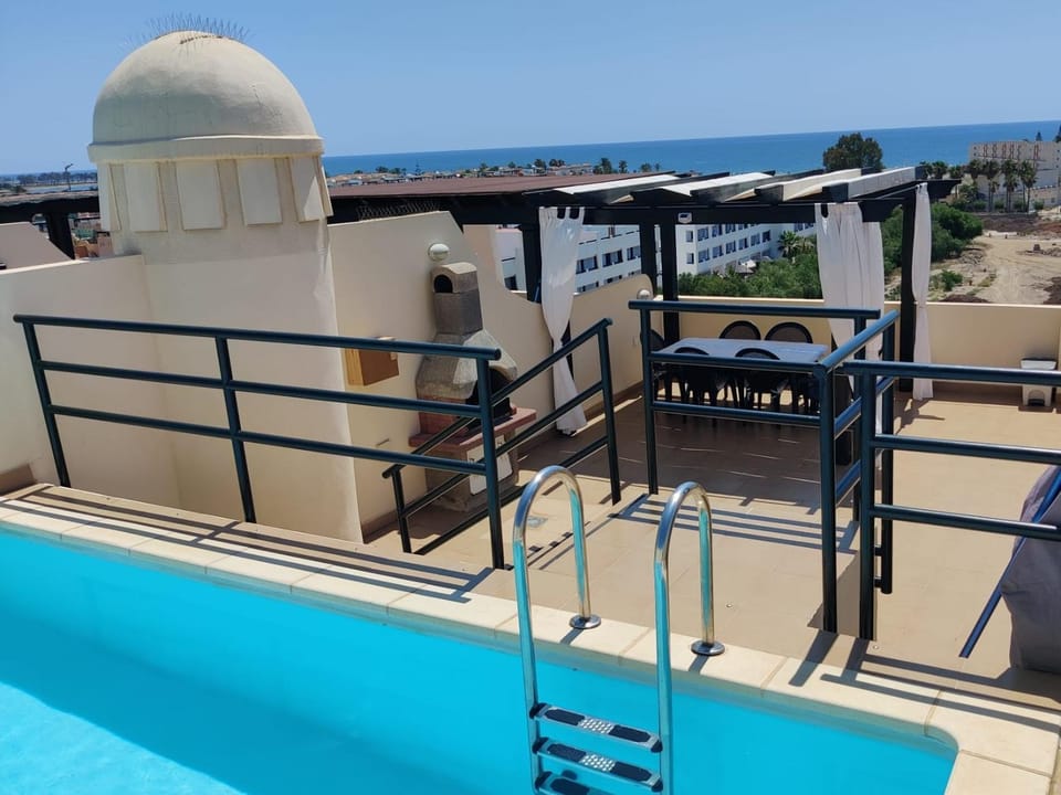 BBQ facilities, Balcony/Terrace, Sea view, Swimming pool