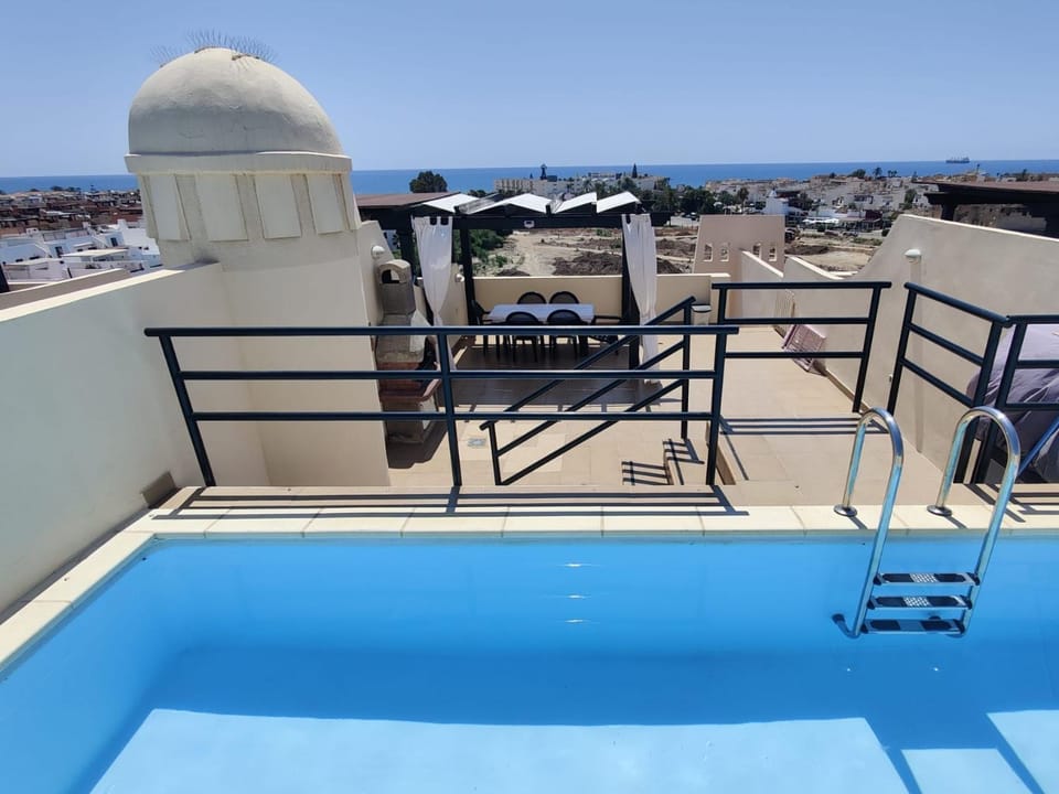 BBQ facilities, Balcony/Terrace, Sea view, Swimming pool