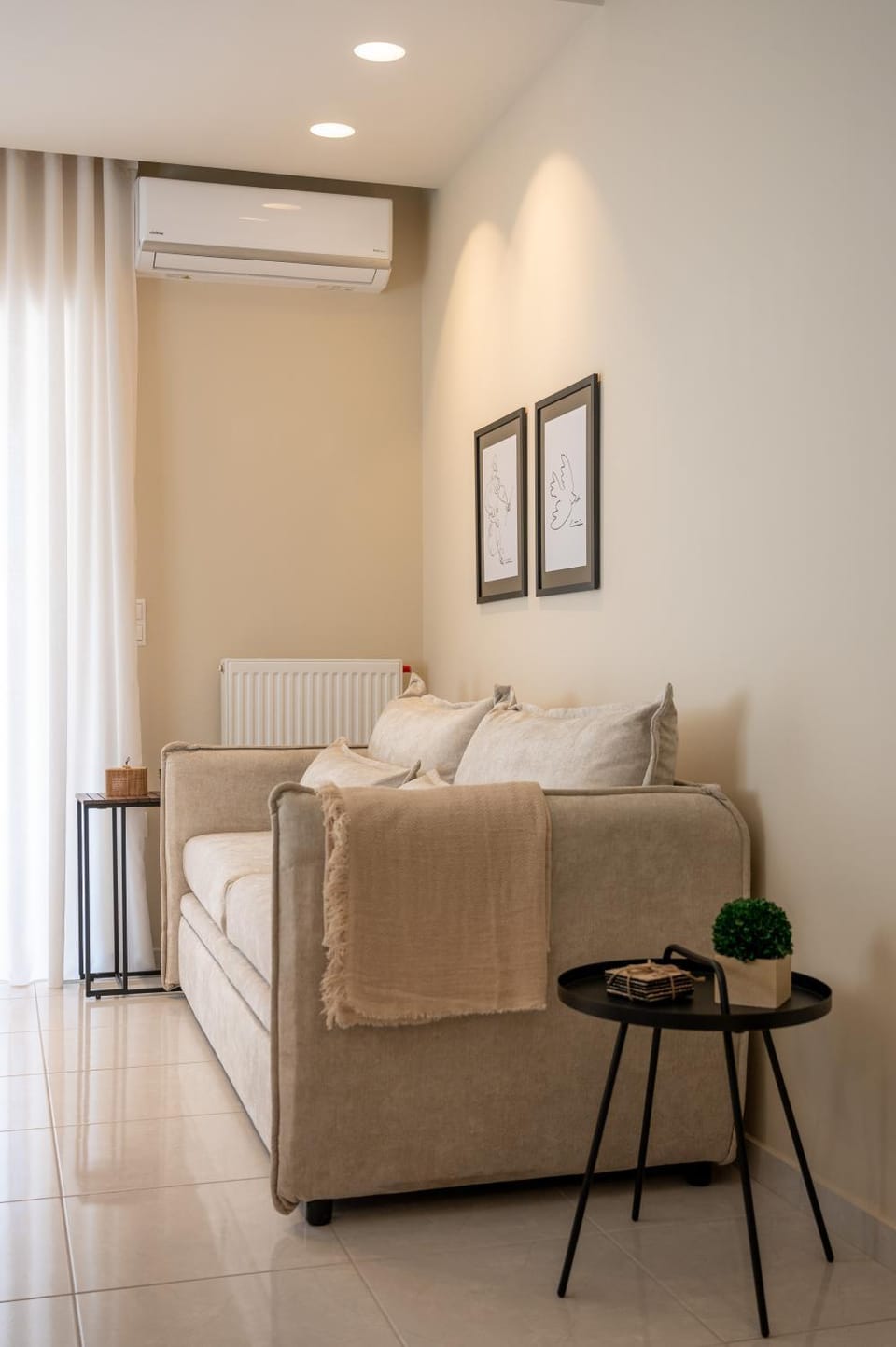 Property building, Living room, Seating area, internet, air conditioner