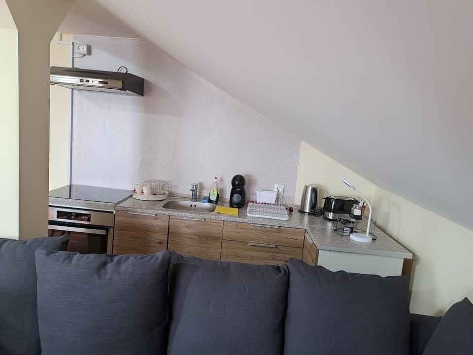 Kitchen or kitchenette, Living room, Seating area, Dining area