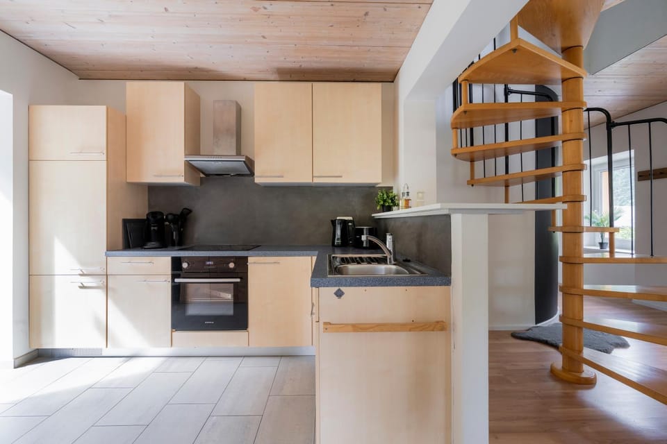 Kitchen or kitchenette, dishwasher, oven, stove, toaster