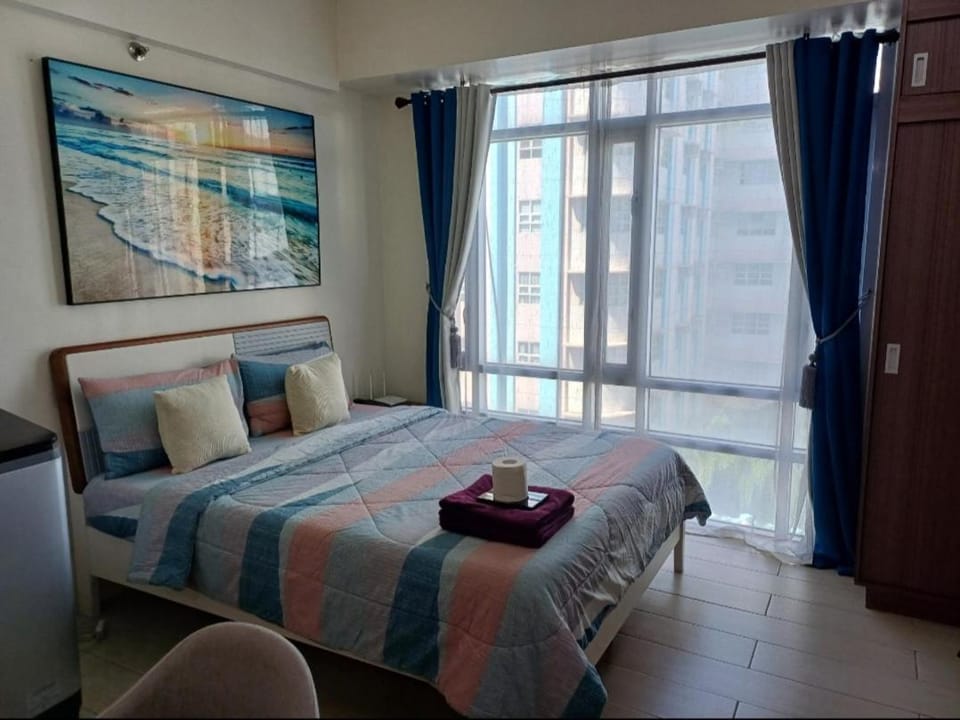 Pasay Staycation with Parking Space in 150 Newport Boulevard near Resort World & NAIA T3 Hotel in Pasay