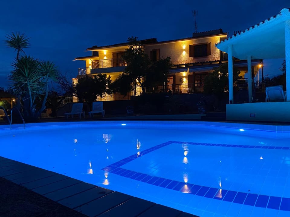 Property building, Night, Swimming pool