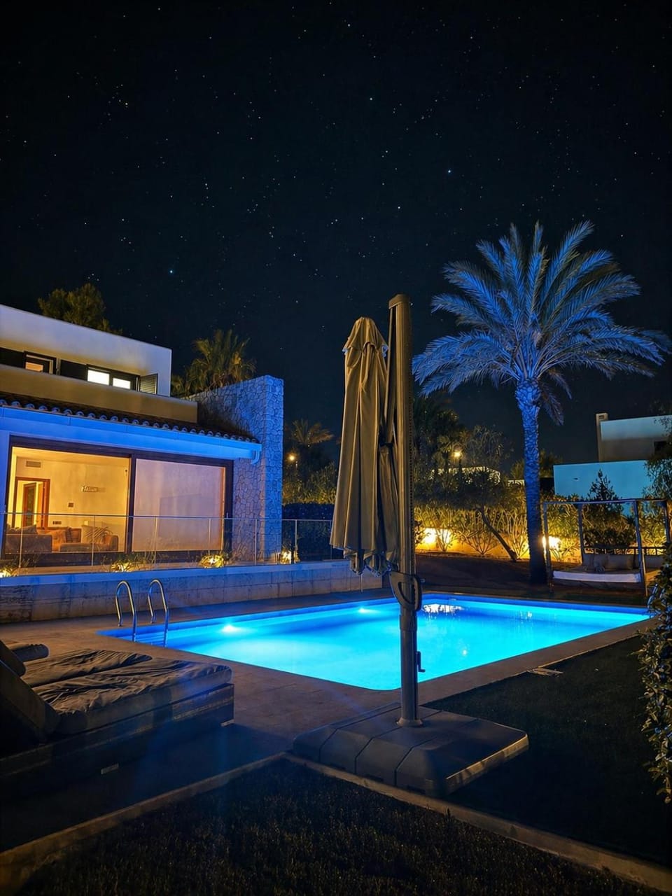 Property building, Night, Pool view, Swimming pool, sunbed