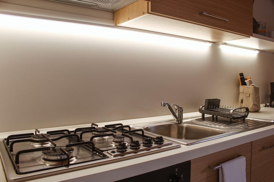 Kitchen or kitchenette, stove
