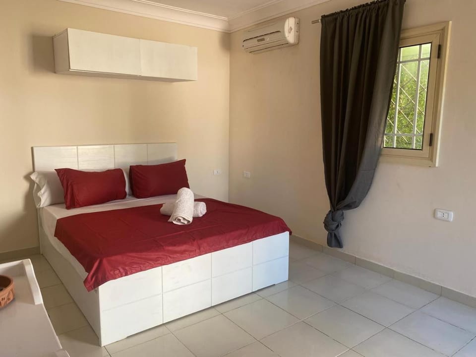 Bed, Photo of the whole room, Bedroom, towels, air conditioner