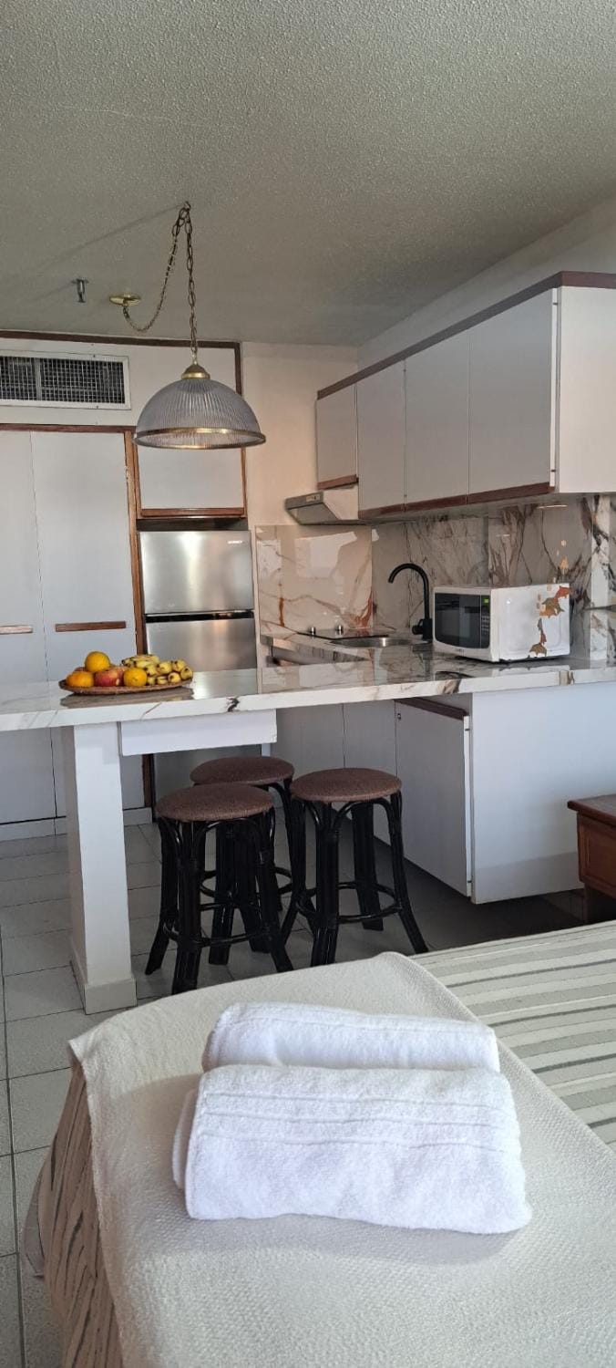 Kitchen or kitchenette, stove, kitchen