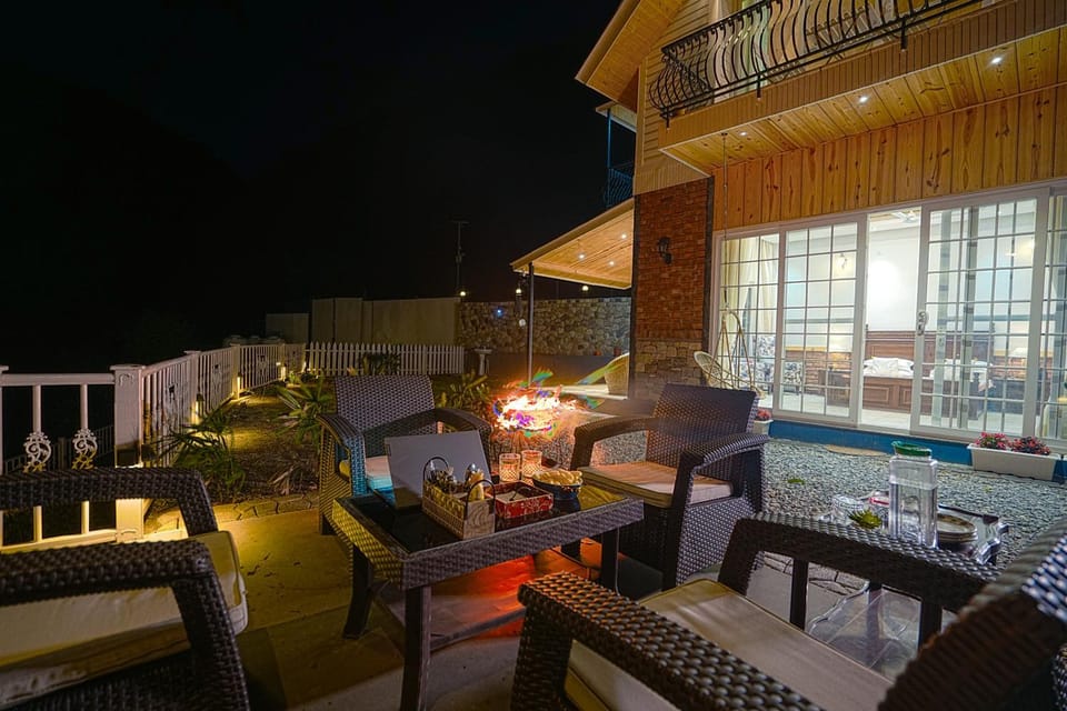 Property building, Patio, Night, BBQ facilities, View (from property/room), Seating area, Garden view, Dinner
