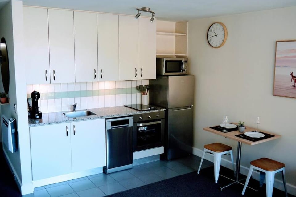 Kitchen or kitchenette, Dining area, dishwasher, oven, stove, toaster