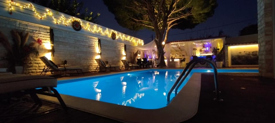 Night, Pool view, Swimming pool, sunbed