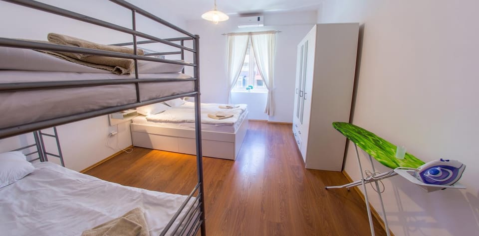 Bed, Photo of the whole room, Bedroom, bunk bed, towels