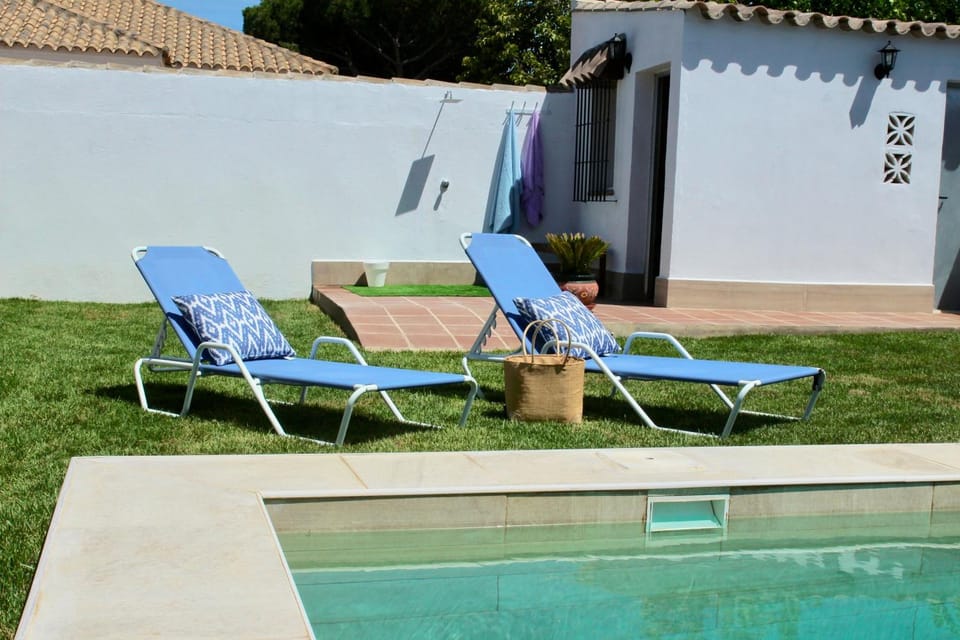 Property building, Living room, Swimming pool