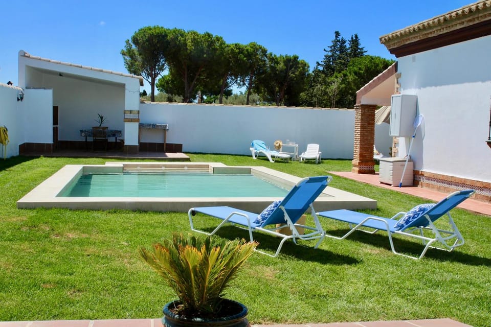 Property building, Living room, Swimming pool