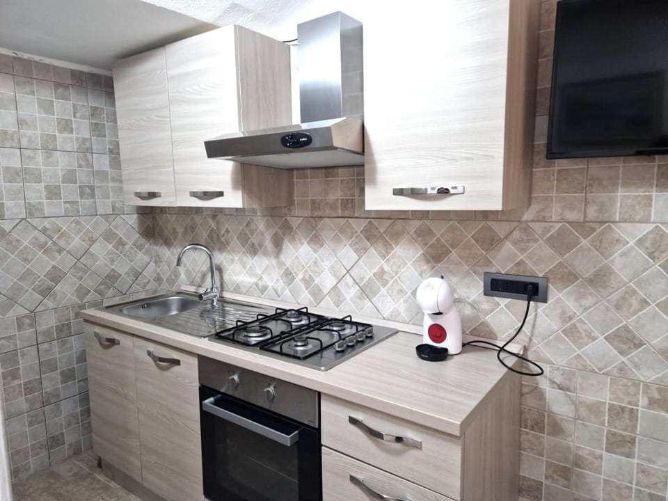 Kitchen or kitchenette, stove