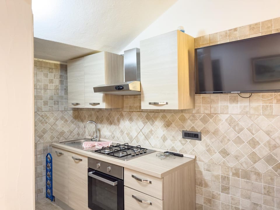 Kitchen or kitchenette, oven, stove