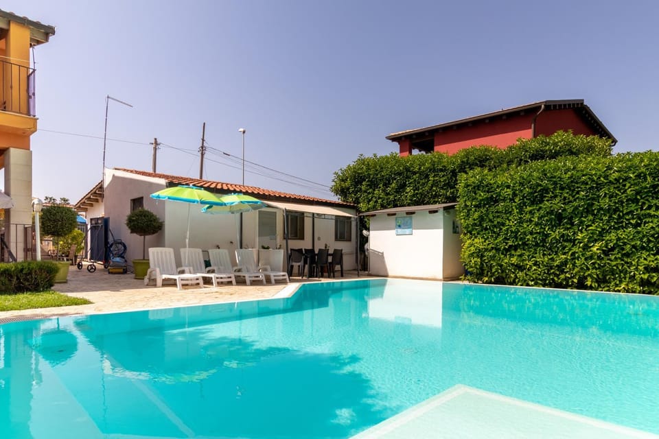 Property building, Living room, Swimming pool
