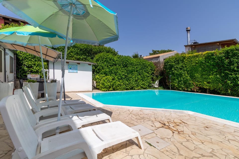 Property building, Living room, Swimming pool