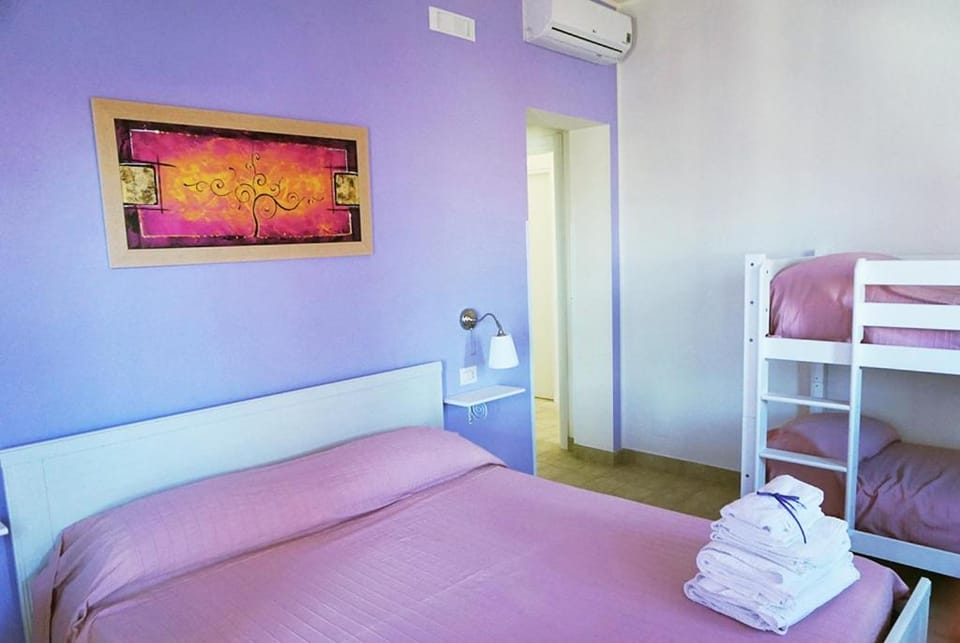 Bed, Photo of the whole room, Bedroom, bunk bed, towels, air conditioner